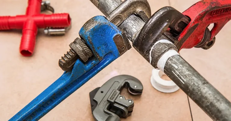 Plumbing pipe wrenches used to fix a stubborn toilet clog that home remedies could not clear