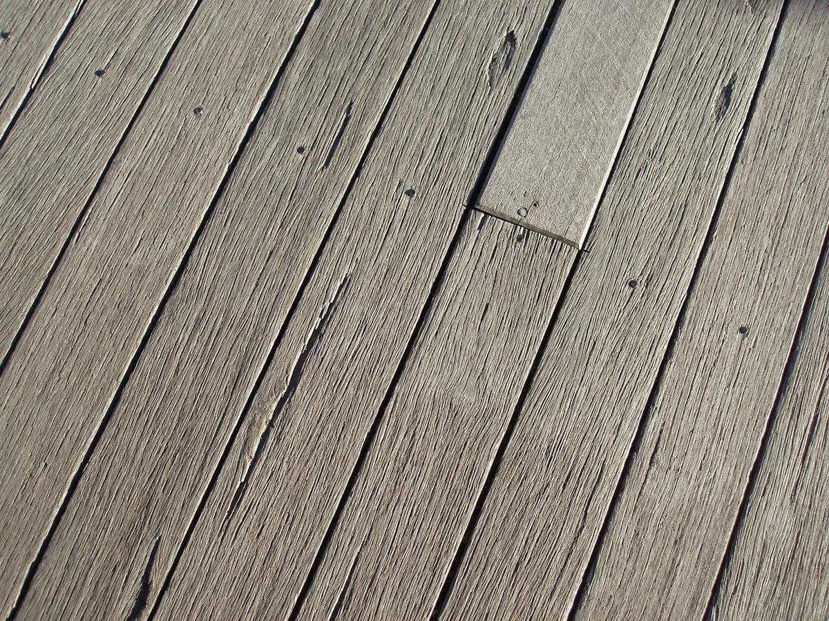 Close-up of wood deck boards showing plank grain and pattern
