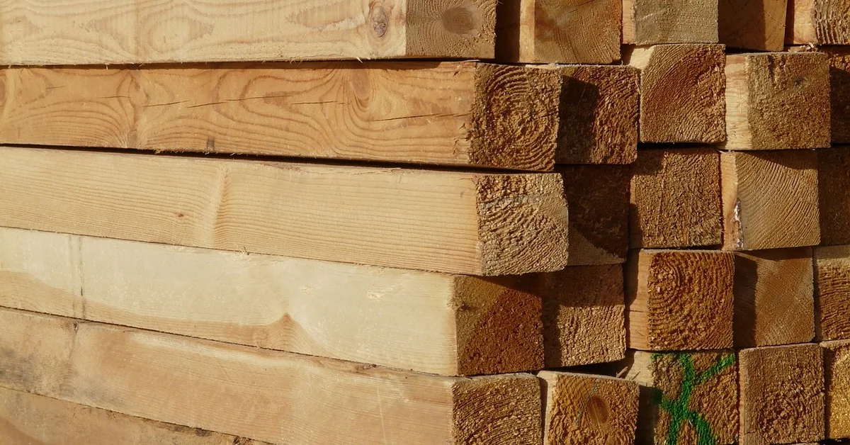 Stacked lumber boards at a wood supplier