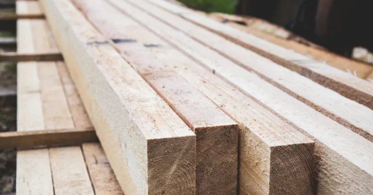 stacked lumber boards at a wood yard ready for purchase