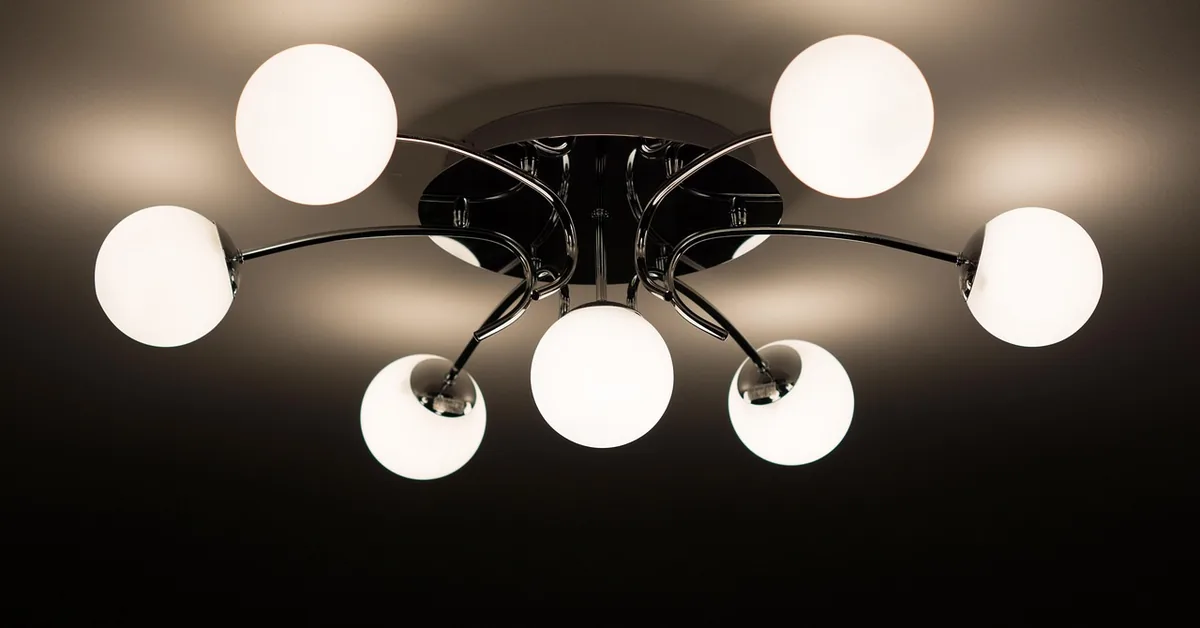 Modern multi-globe LED ceiling light fixture installed and illuminated