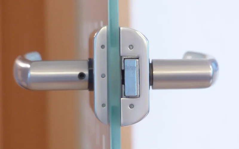 Close-up of a door knob and lock set on a front door