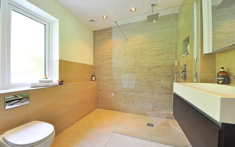 frameless glass shower door installed in a modern walk-in bathroom shower frameless glass shower door installed in a modern walk-in bathroom shower