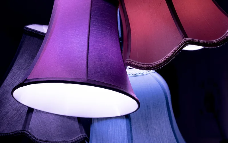 several fabric lampshade styles and colors displayed together showing shape and color options several fabric lampshade styles and colors displayed together showing shape and color options