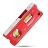 Small magnetic torpedo level for checking shelf bracket alignment