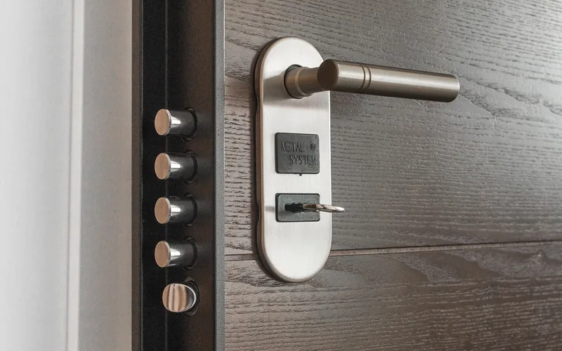 A multi-point security lock with a key partially inserted