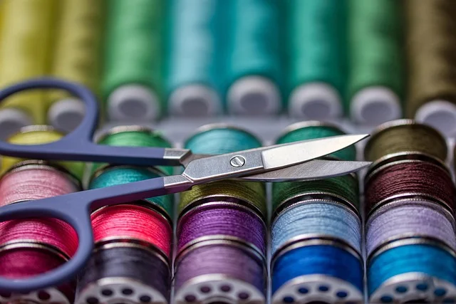 Sewing kit with thread and scissors for snap fastener repairs