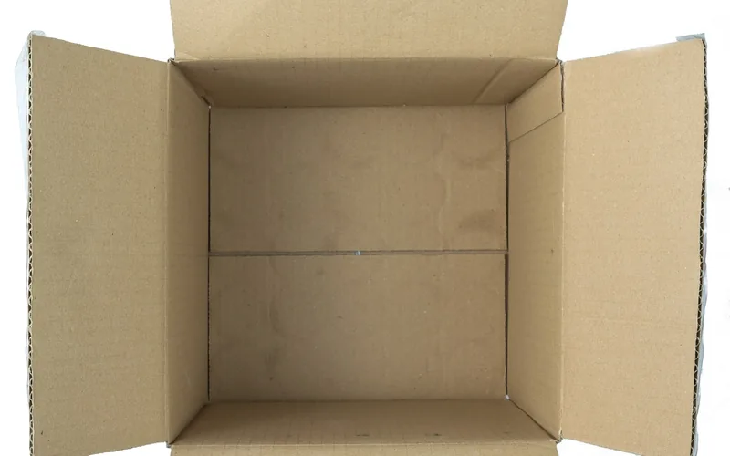 empty corrugated cardboard box open and ready for packing before mailing