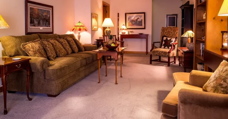 Living room with multiple lamps showing fabric and stained-glass style lamp shades