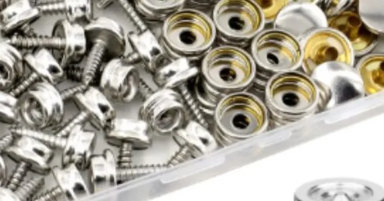 Canvas snap fastener kit with sockets, studs, and screws in a storage box