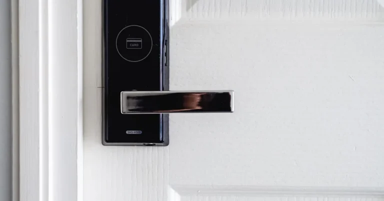 A digital electronic keypad deadbolt lock mounted on a door