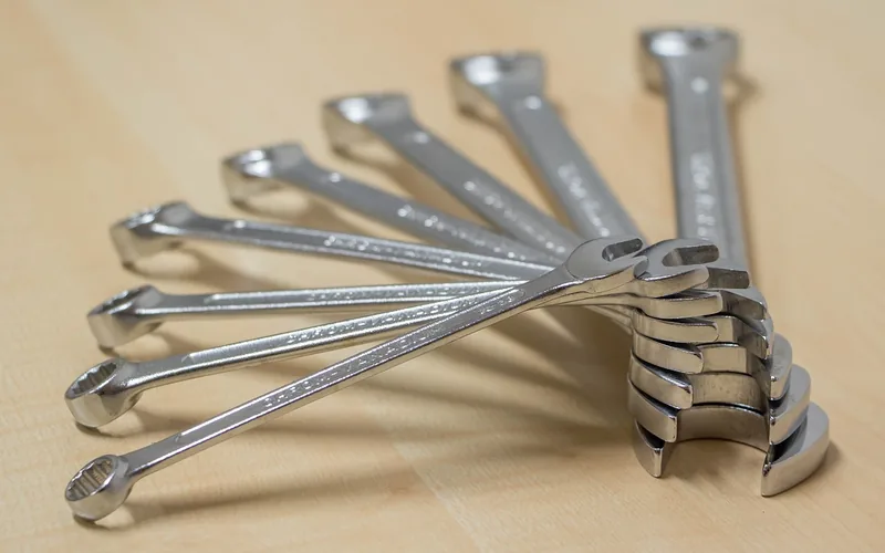 screwdrivers and hex wrenches used to remove and reverse a lever door handle screwdrivers and hex wrenches used to remove and reverse a lever door handle