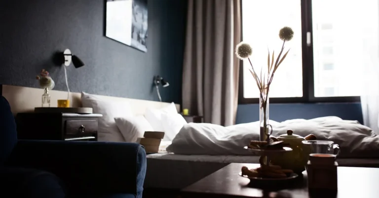 cozy hotel room with bed and window at night representing a secure overnight stay