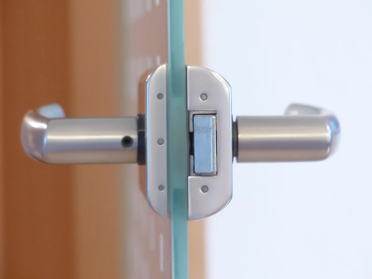 Close-up of a metal door knob and lock