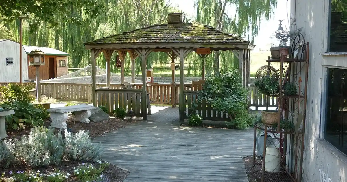 backyard deck boardwalk showing consistent gap spacing between weathered deck boards