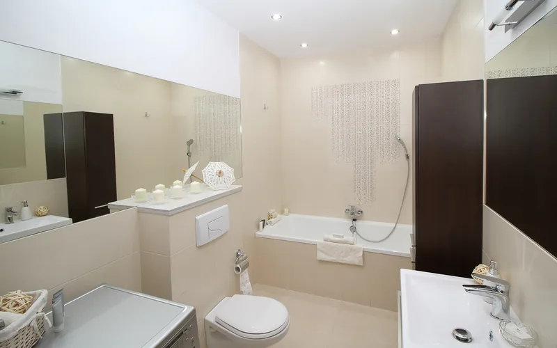 Clean modern bathroom with a properly installed toilet after a plumbing repair