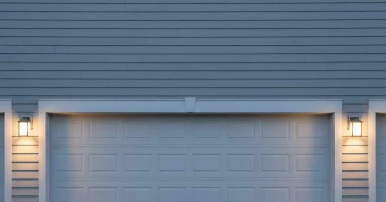 Outdoor garage lights sized to flank a two-car garage door with matching wall sconces
