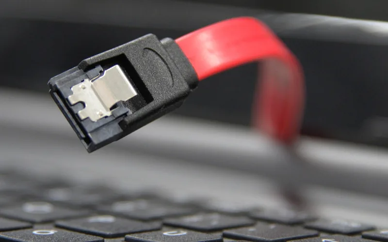 SATA power cable connector used to power an RGB fan hub inside a PC case