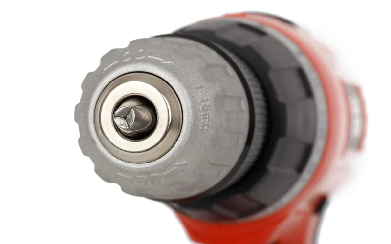 cordless drill chuck close-up used for installing bifold door hardware