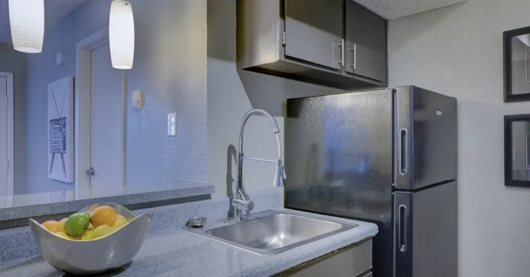 Clean kitchen counter and sink after removing a stain from a Formica-style countertop