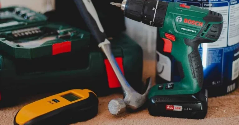Cordless drill, hammer, and stud finder used to compare hammer drill vs impact drill tools