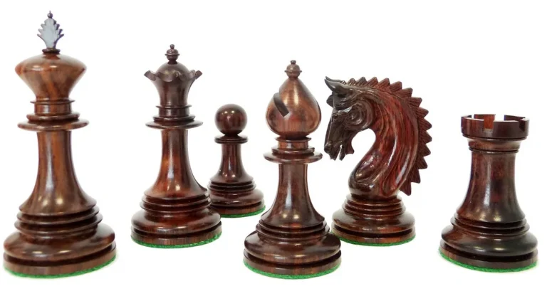 Rosewood chess pieces showing dark reddish-brown wood grain and hardness