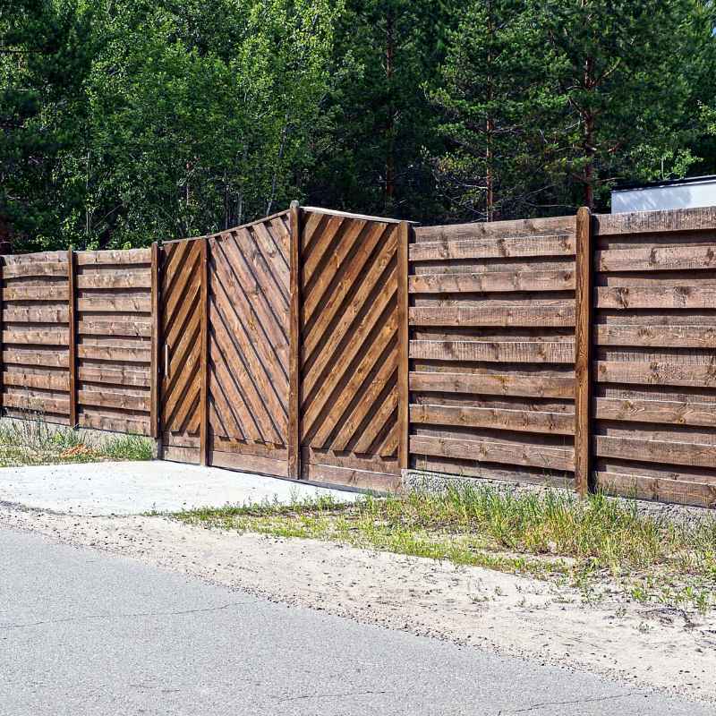 How Much Does It Cost To Build A Wood Fence In 2025