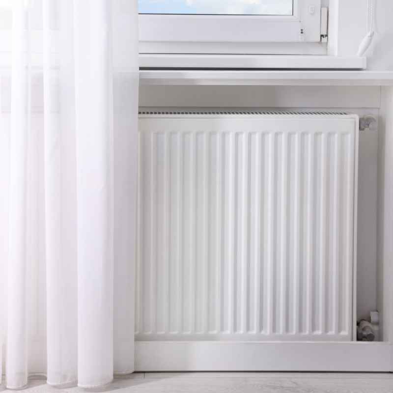 What Home Heating Systems Have Radiator Grills Under Windows?