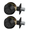Two matte black keyed-alike deadbolt locks in packaging