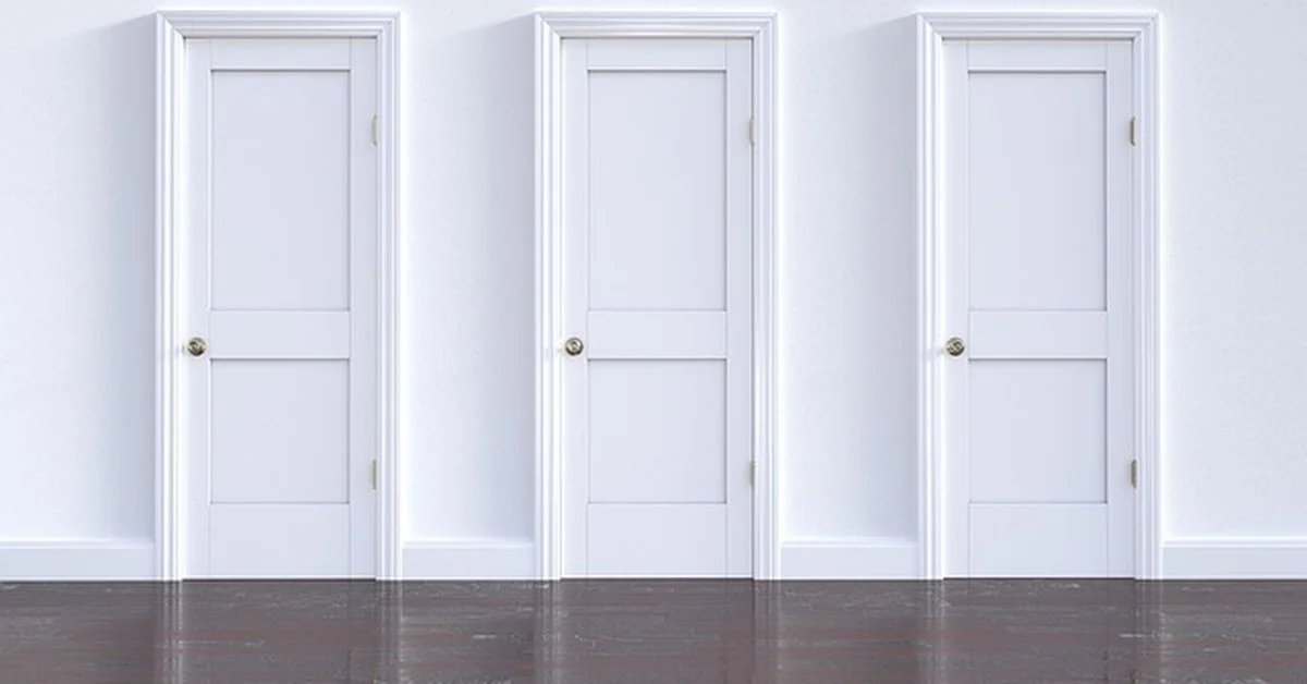 Three plain interior doors with basic doorknobs no deadbolt