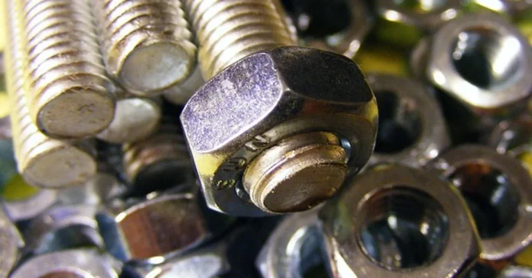Broken bolt threads and nuts closeup mechanic hardware
