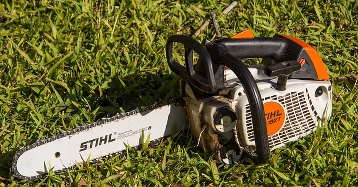 Chainsaw with visible chain showing correct tension and slack