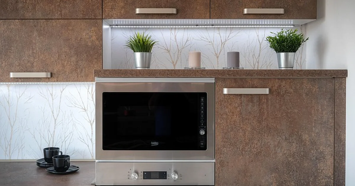 Kitchen cabinets with modern handles suited for childproof cabinet locks