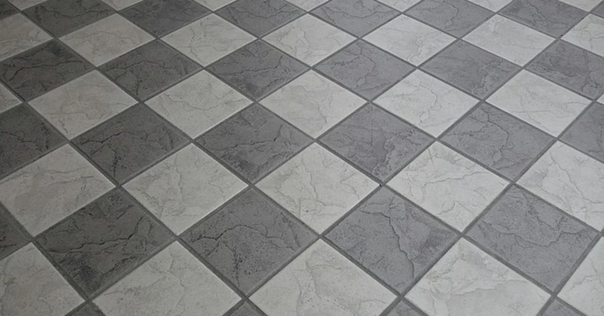 Clean tile floor free of adhesive residue