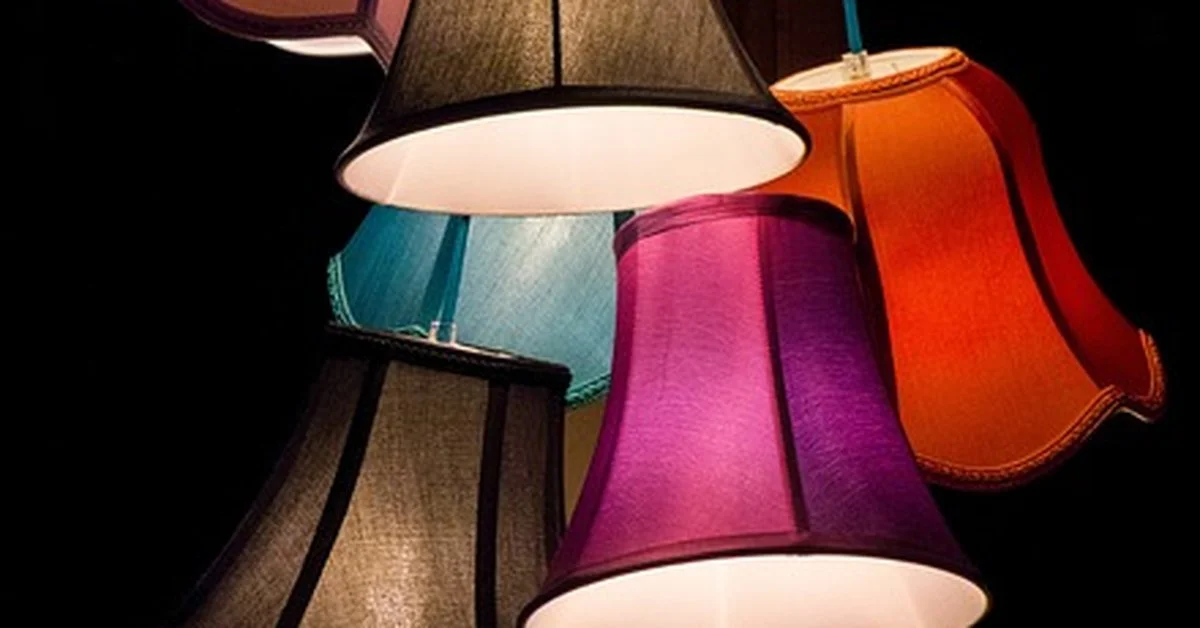 Colorful multi-light chandelier fixture with several lampshades