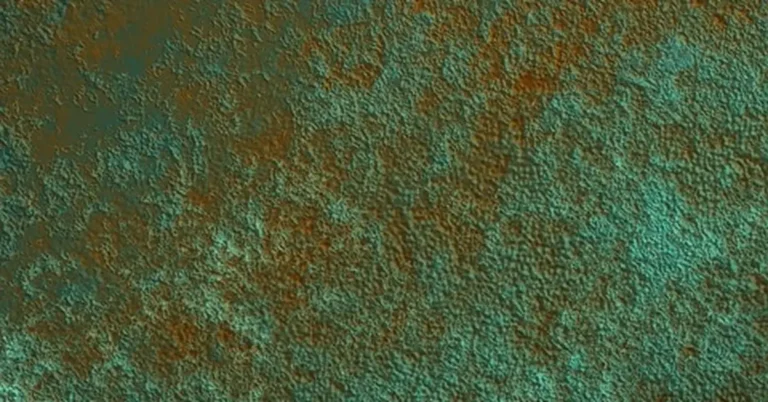 Close-up of green and blue copper patina finish formed by oxidation