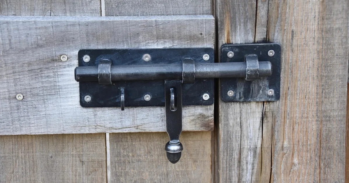 Door lock set into a wood door frame prone to deteriorated screw holes