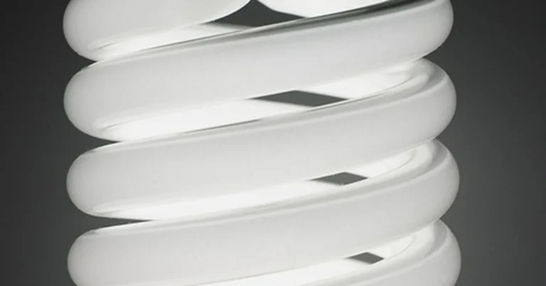 Lit compact fluorescent CFL bulb, spiral tube style