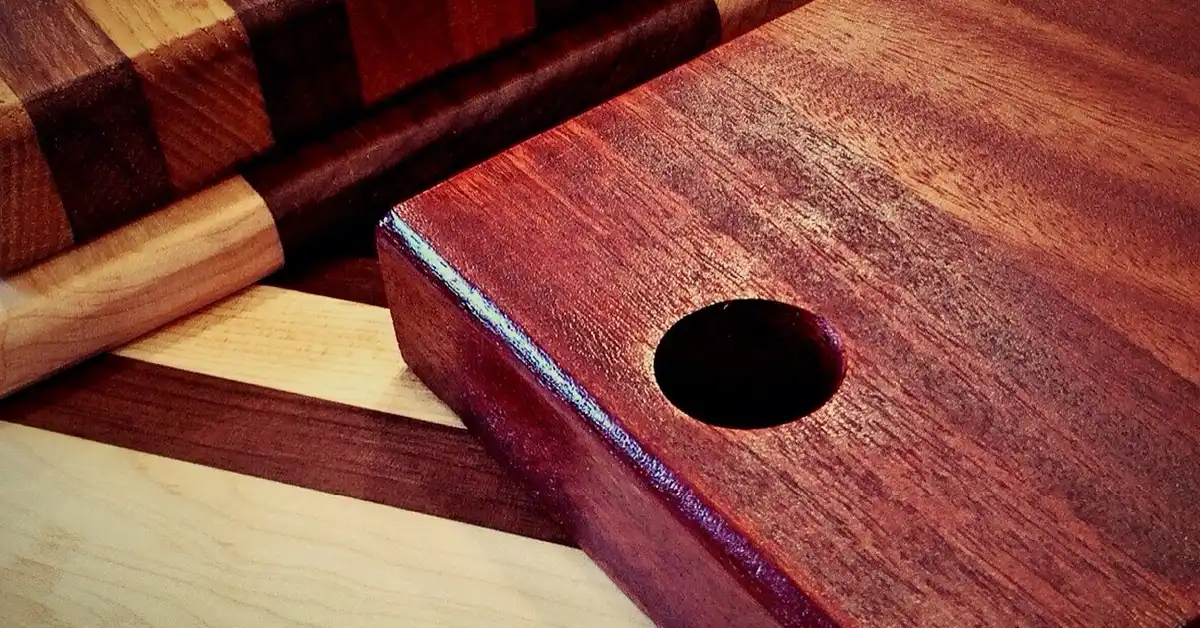 Handmade cutting boards made from strips of different wood species