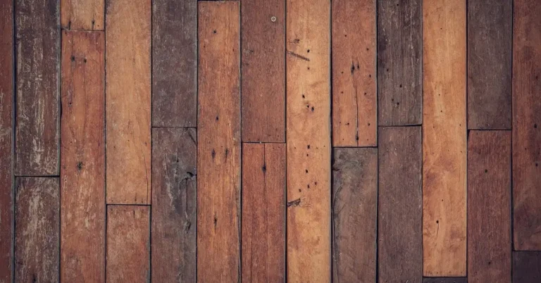 Close-up of sanded hardwood floor planks ready for staining