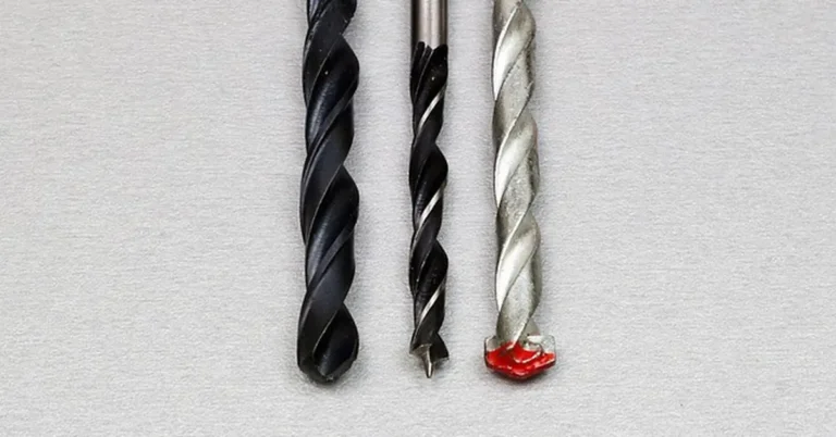 Hole saw, twist, and spade drill bits for wood side by side