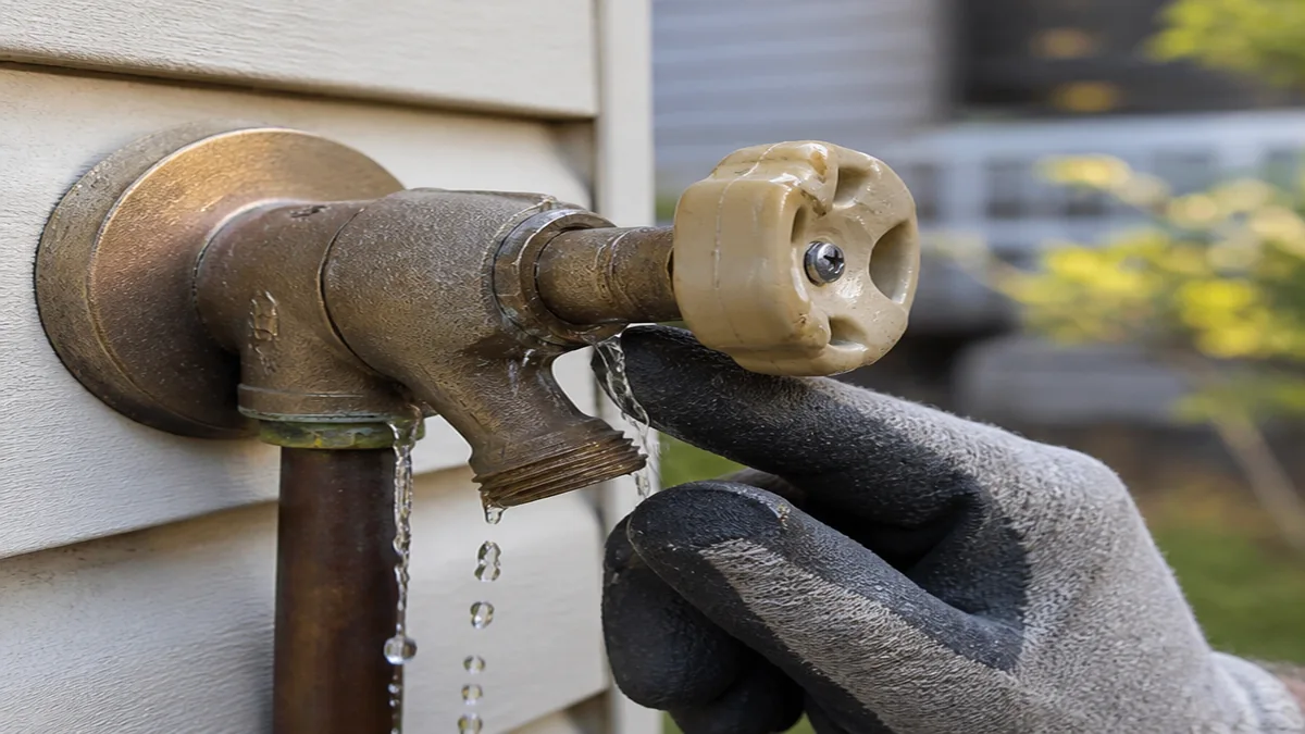 Prier-style outdoor faucet and repair parts checked during a leak diagnosis