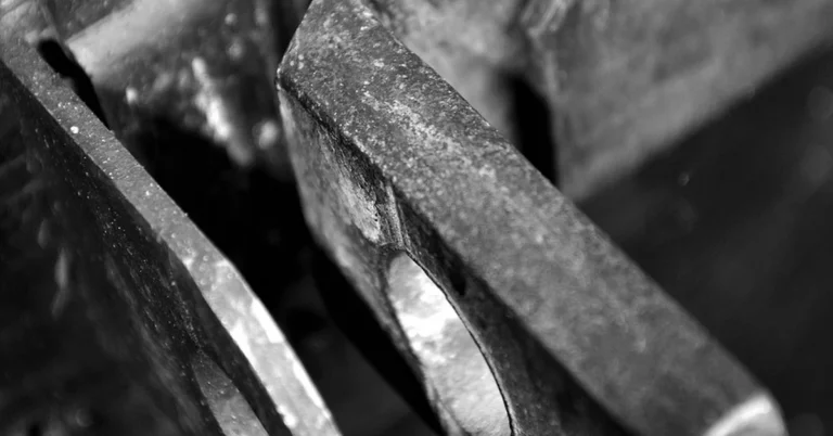 Close-up of a deadbolt locking mechanism and mounting screw