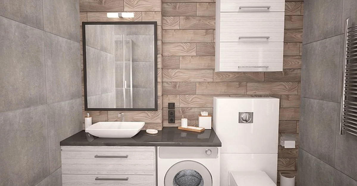 Front-load washing machine with round door in a bathroom laundry setup