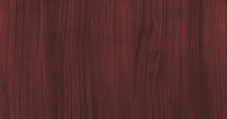 Close-up of reddish-brown mahogany wood grain texture
