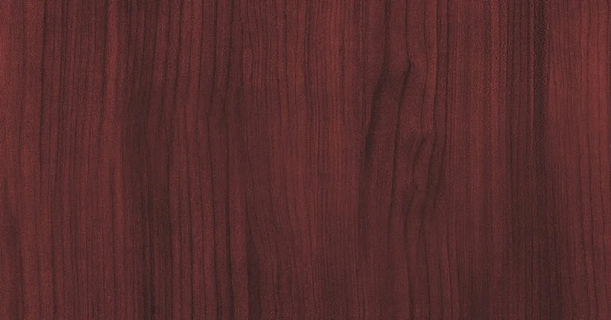 Close-up of reddish-brown mahogany wood grain texture