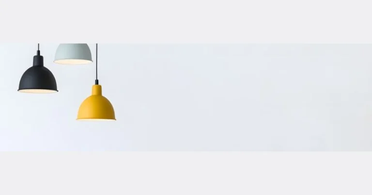 Three pendant lights hanging black grey and yellow