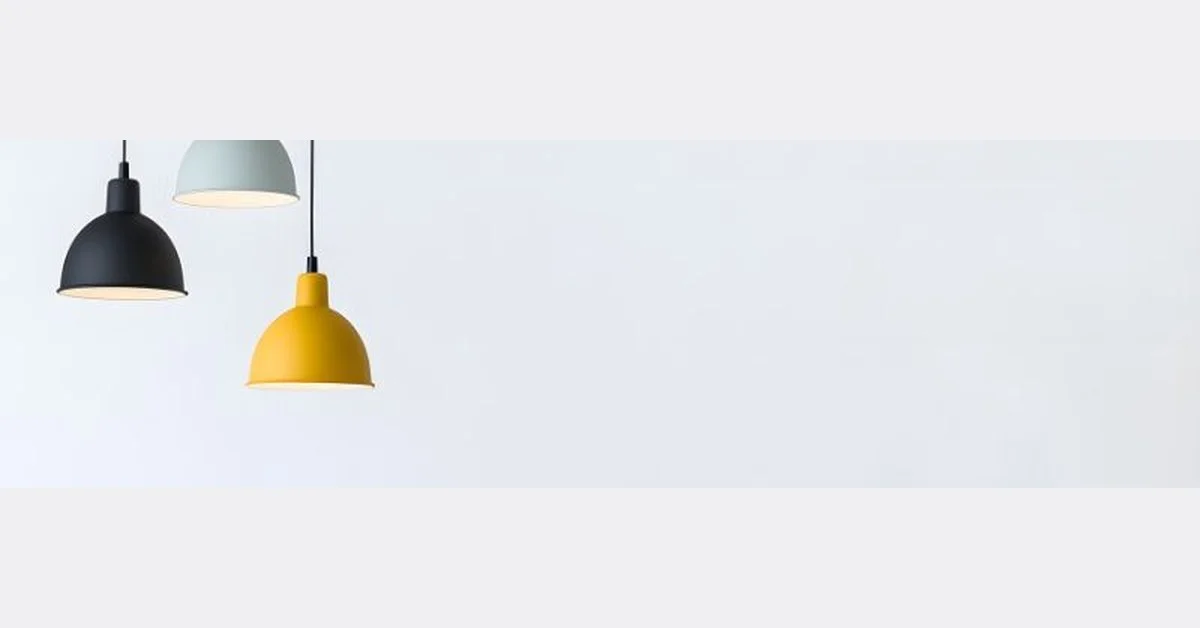 Three pendant lights hanging black grey and yellow