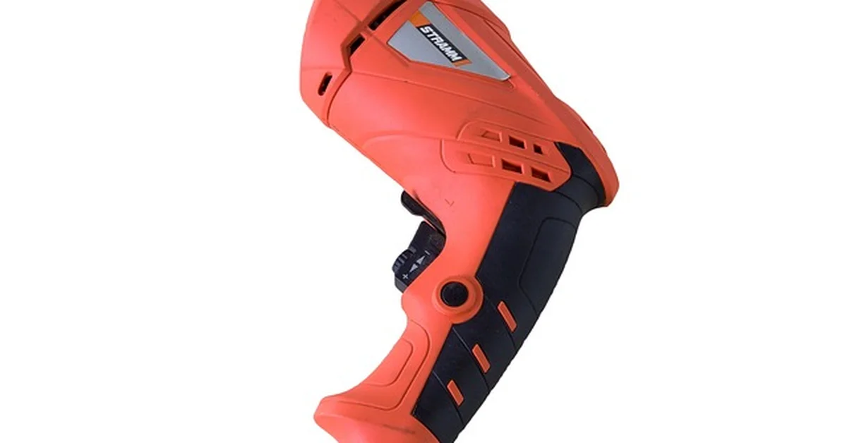 Corded electric drill on a white background, one option in the pneumatic vs electric drill comparison