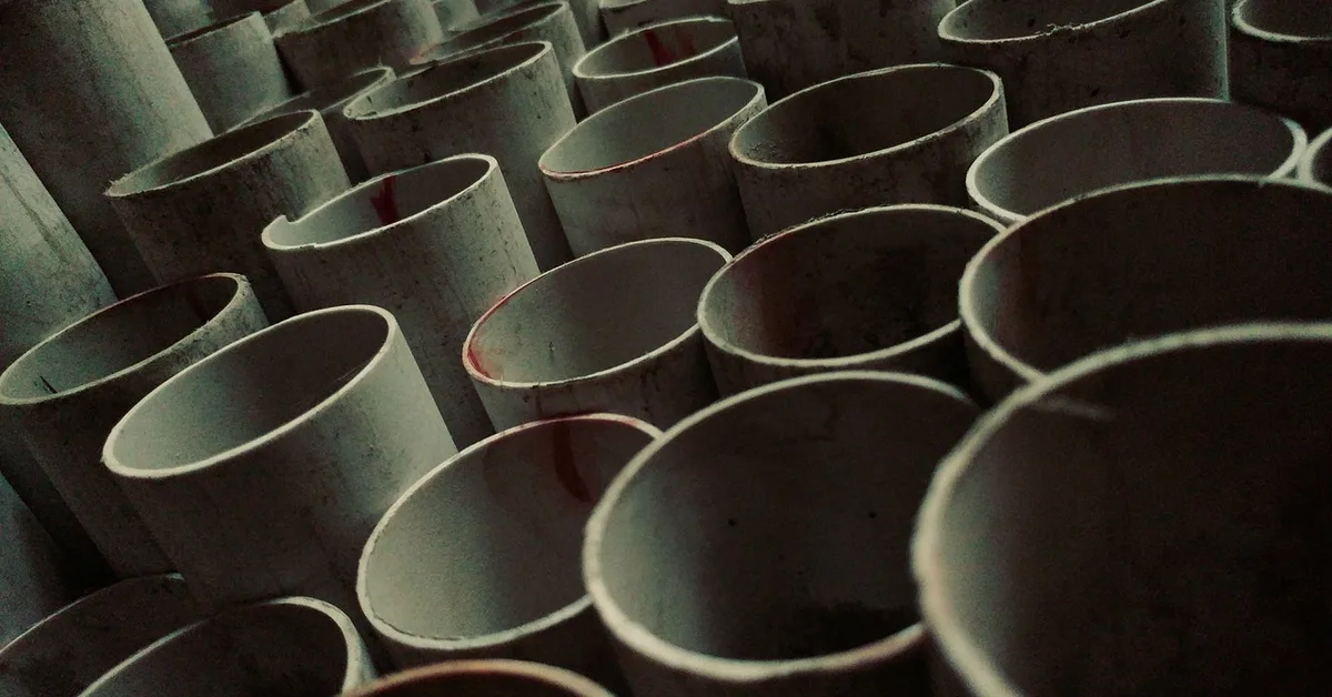 Cut ends of stacked PVC pipes ready for a reciprocating saw blade test